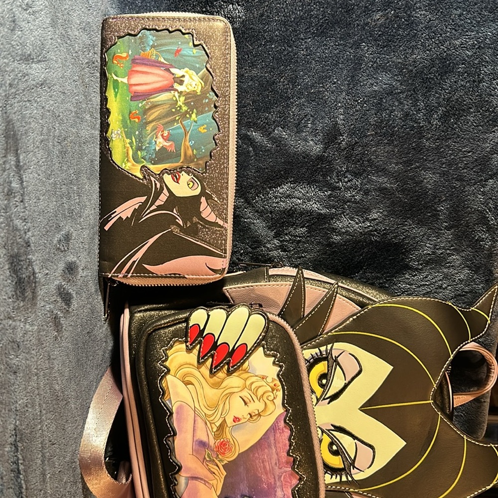 Loungefly Disney villain mini backpack with matching wallet.